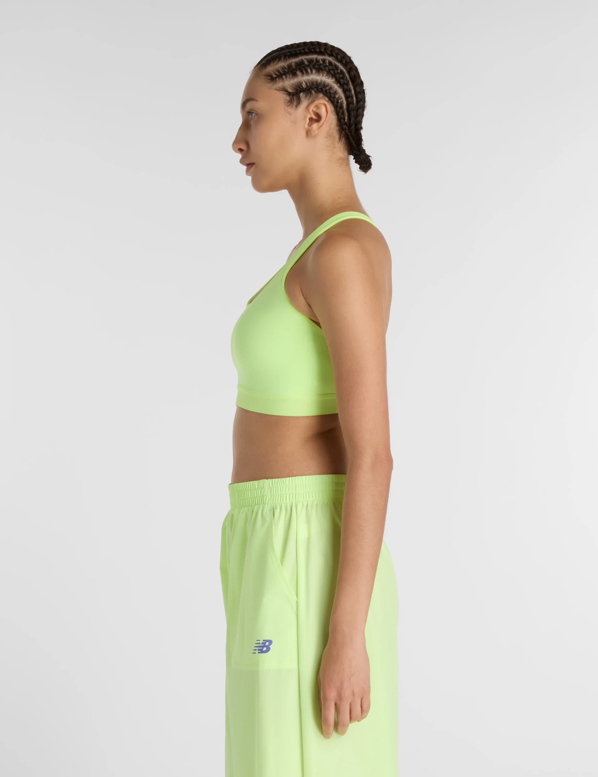 NB Essential Run Bra - Afterglow - Image 2